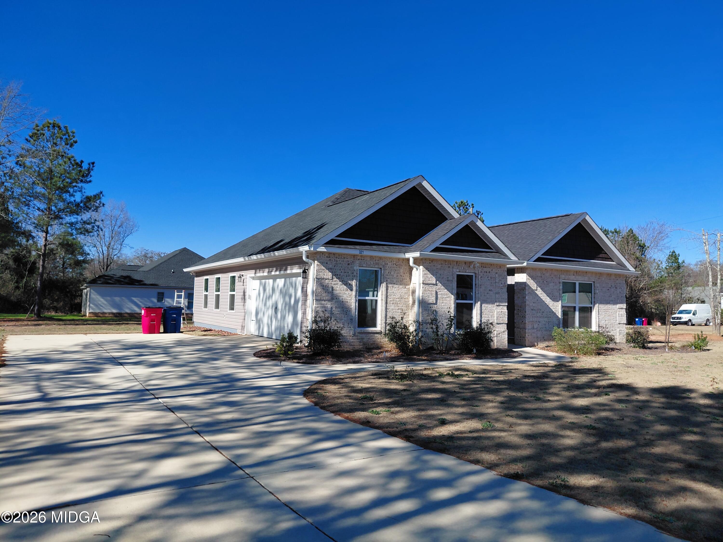 321 Browning Pointe Road Macon, GA 31216 - Photo 15 of 20 a front view of a house with a yard