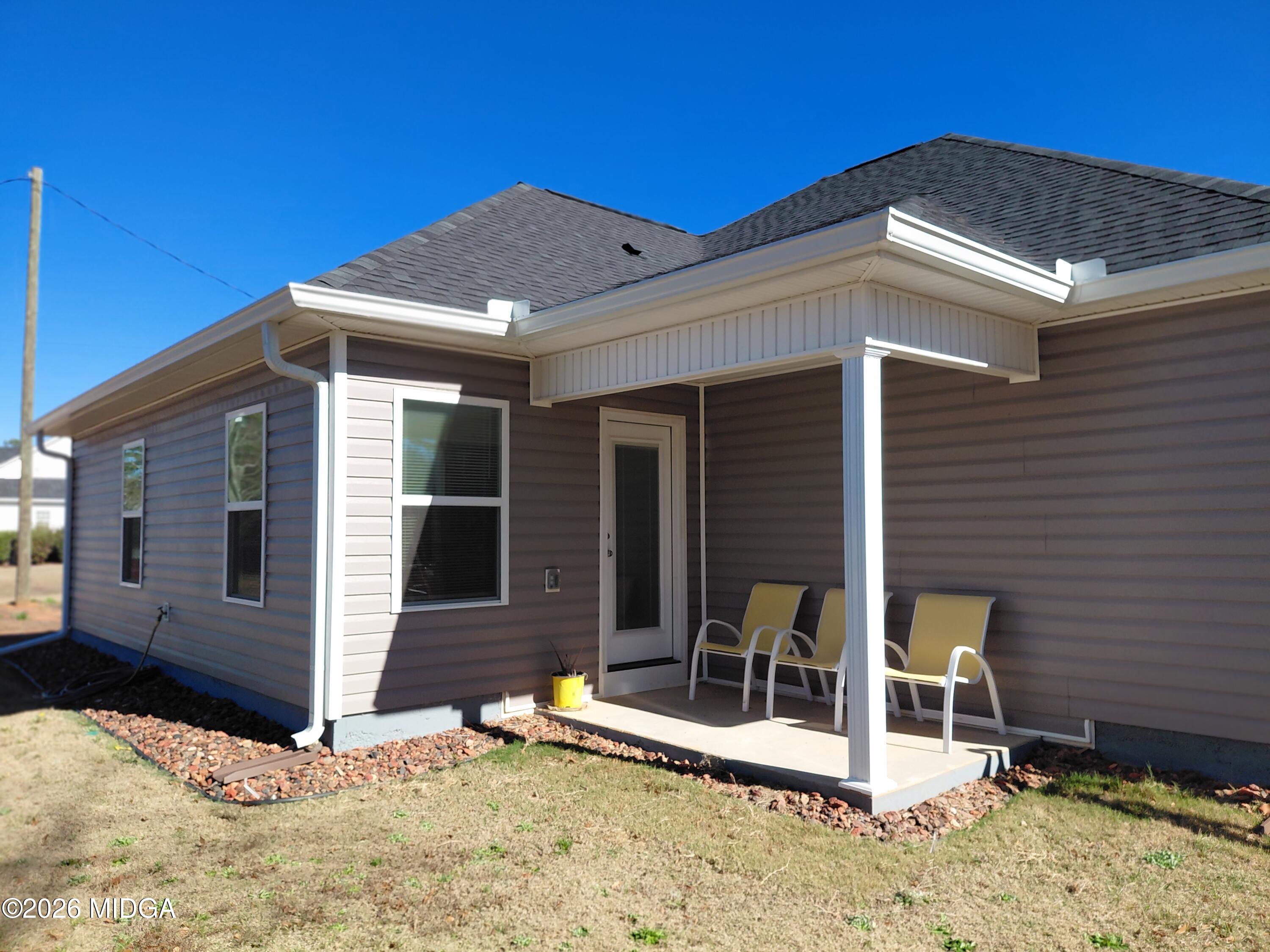 321 Browning Pointe Road Macon, GA 31216 - Photo 16 of 20 a view of house with wooden fence and a porch