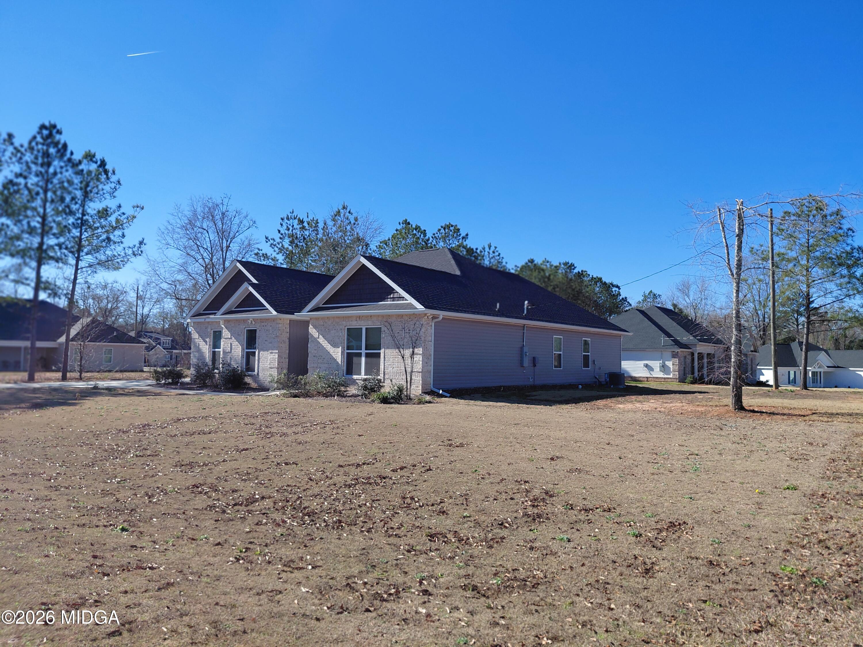 321 Browning Pointe Road Macon, GA 31216 - Photo 19 of 20 a wooden house with a outdoor space