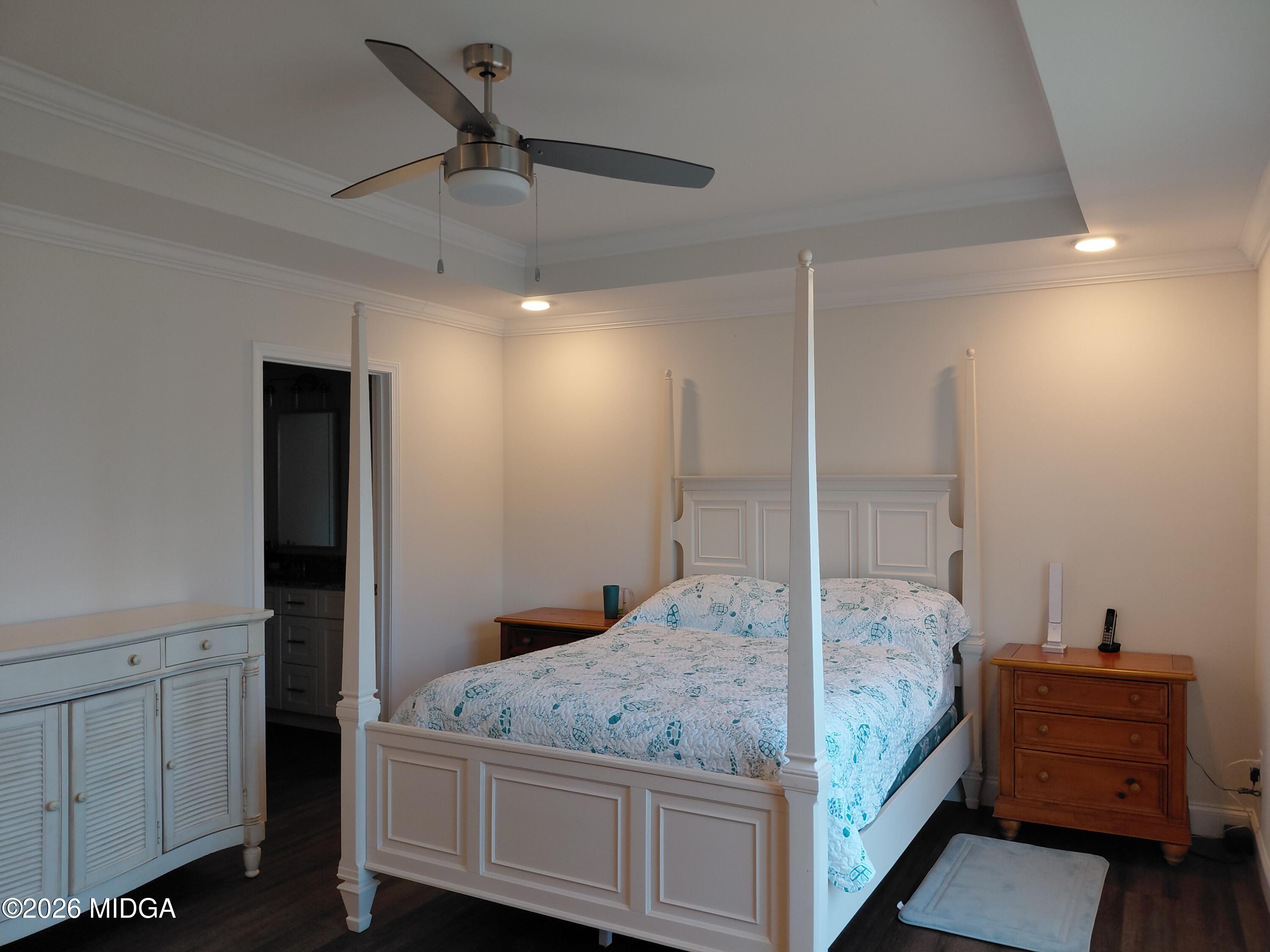 321 Browning Pointe Road Macon, GA 31216 - Photo 4 of 20 a bedroom with a bed and a dresser