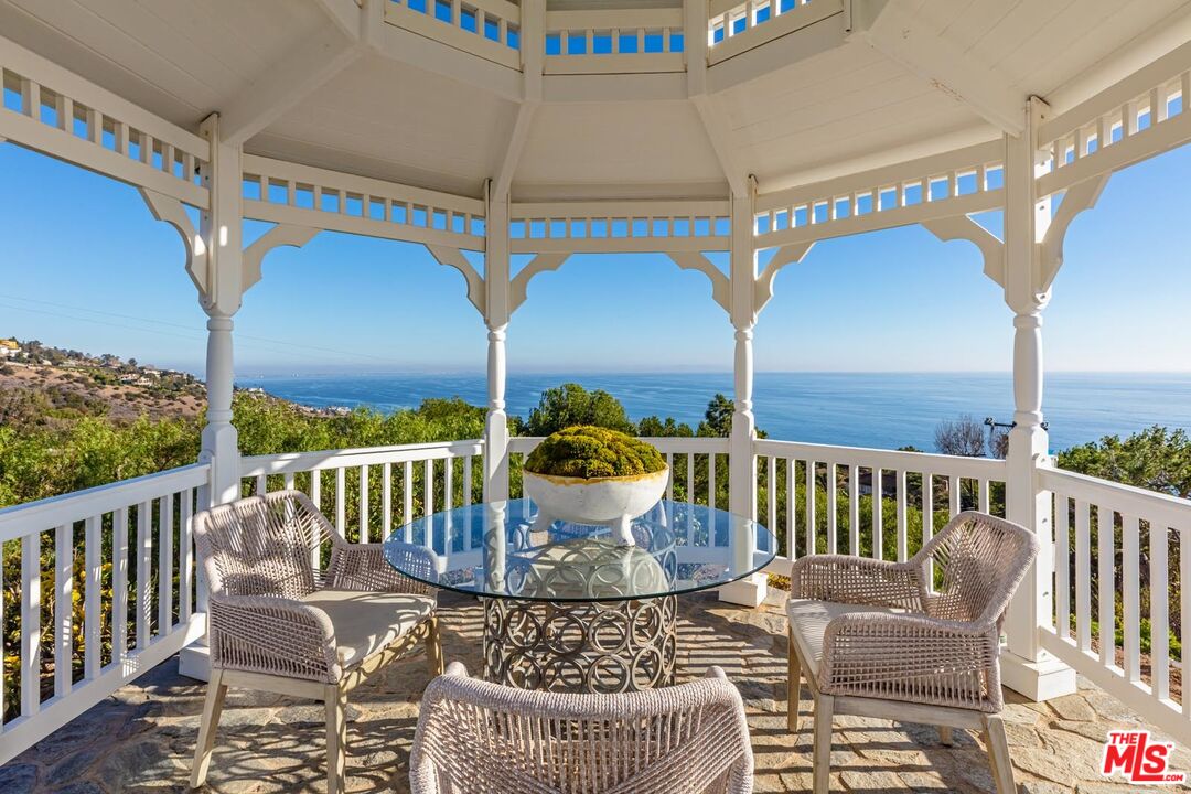 Carbon Mesa Road Malibu, CA 90265 - Photo 11 of 42 a view of two chairs in the balcony
