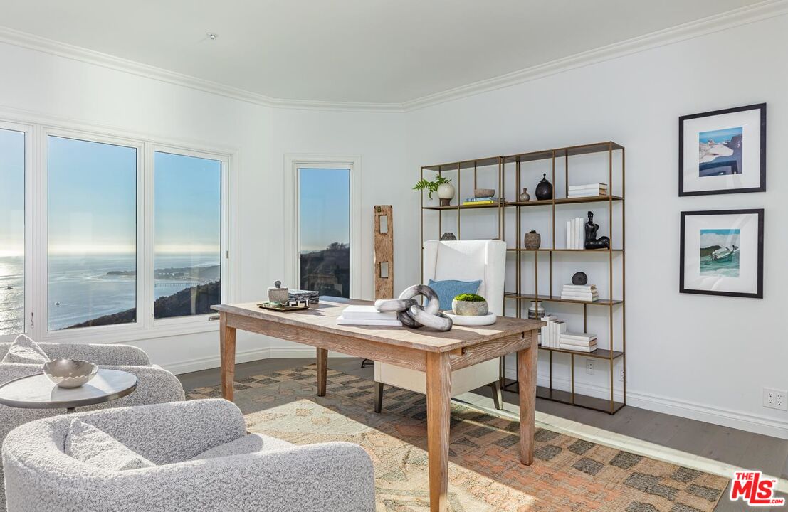 Carbon Mesa Road Malibu, CA 90265 - Photo 13 of 42 a work room with furniture and a large window