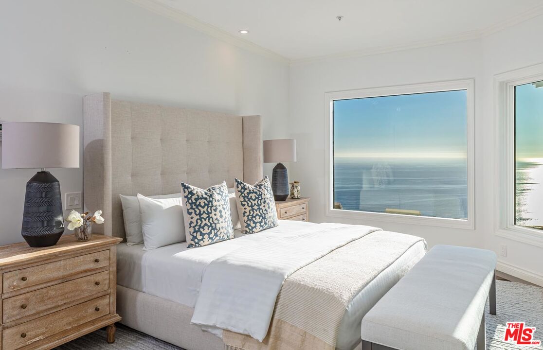 Carbon Mesa Road Malibu, CA 90265 - Photo 14 of 42 a bedroom with a bed and with furniture