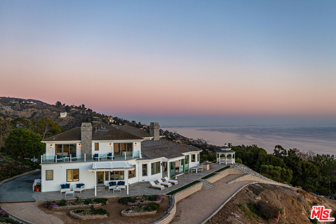 Carbon Mesa Road Malibu, CA 90265 - Photo 27 of 42 a view of a houses with a city street