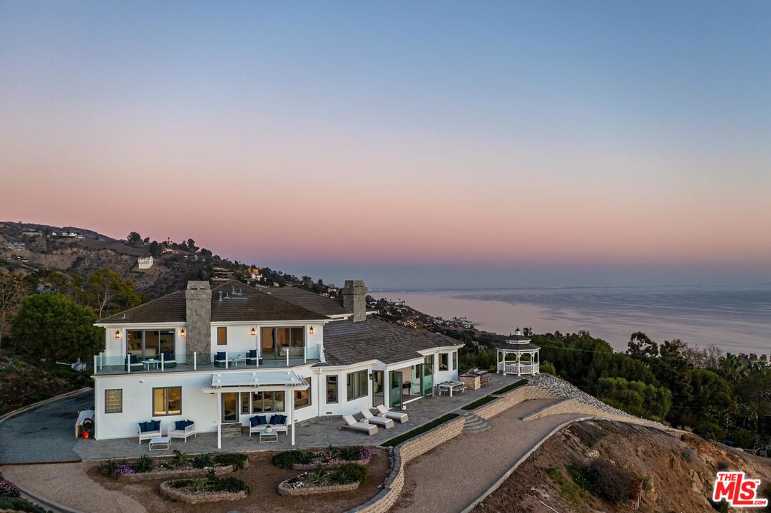 Carbon Mesa Road Malibu, CA 90265 - Photo 29 of 42 a view of a houses with a city street