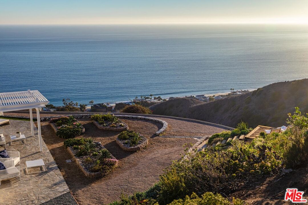 Carbon Mesa Road Malibu, CA 90265 - Photo 31 of 42 a view of a ocean with beach
