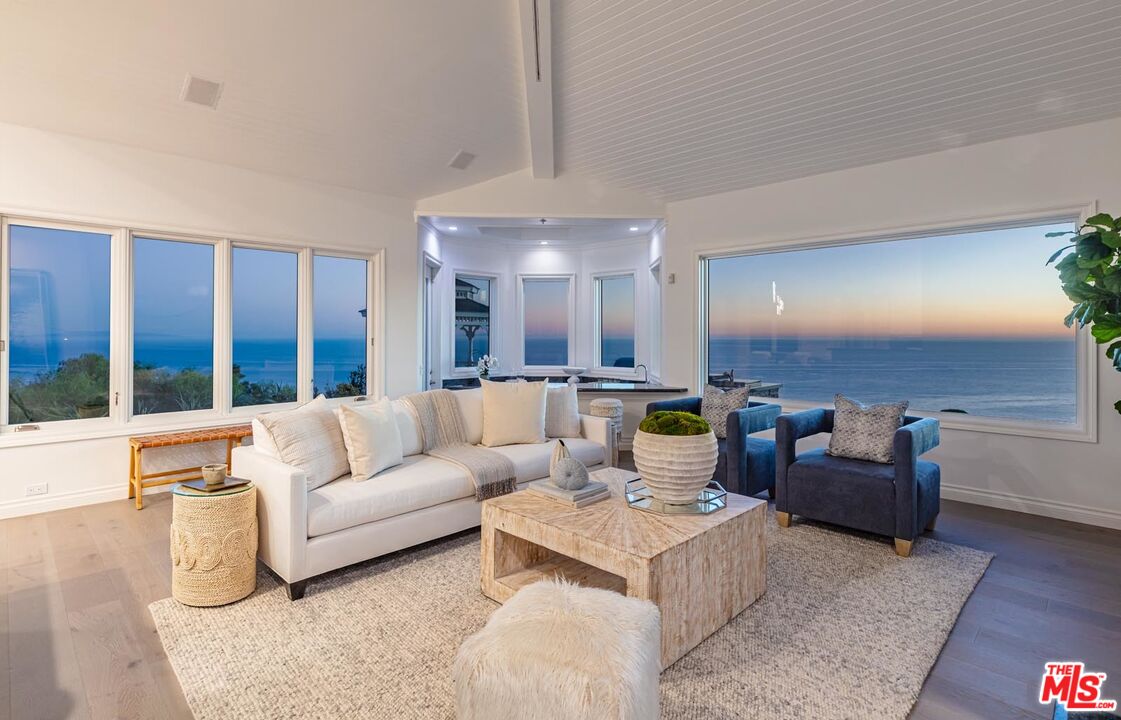Carbon Mesa Road Malibu, CA 90265 - Photo 35 of 42 a living room with furniture and a large window