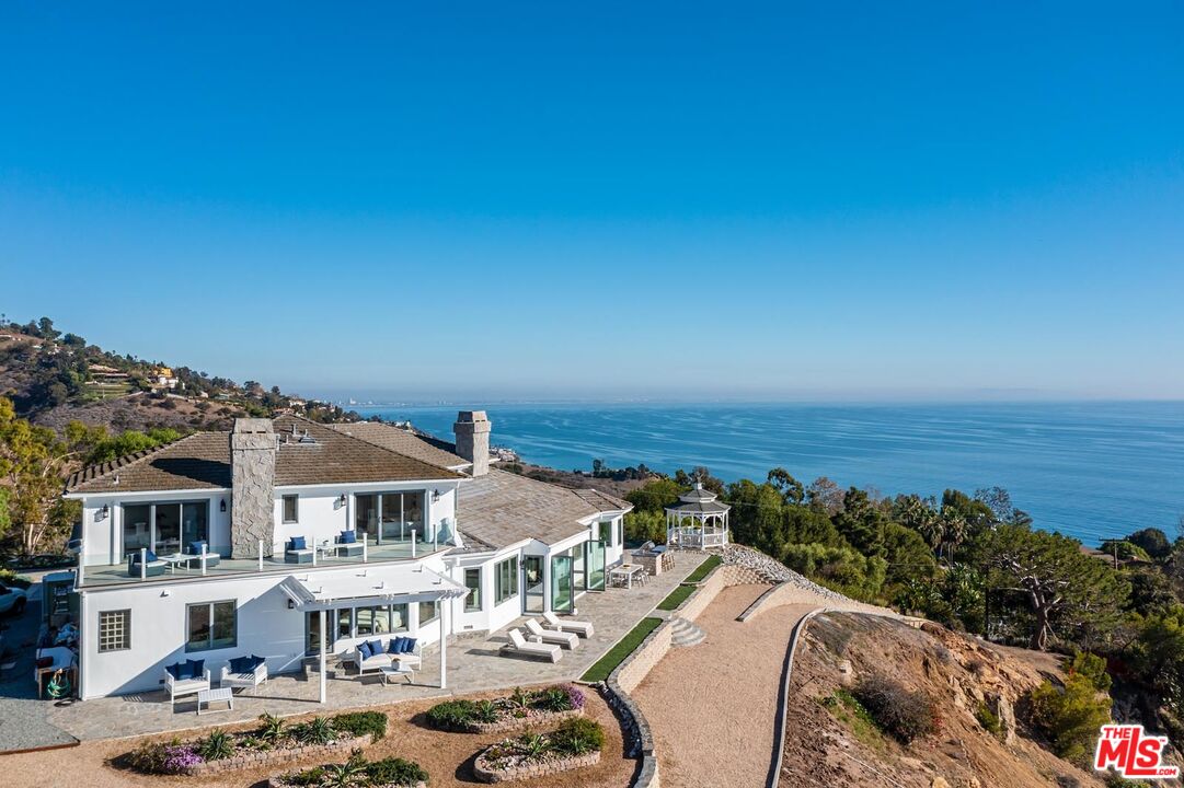 Carbon Mesa Road Malibu, CA 90265 - Photo 40 of 42 a view of a city with lawn chairs
