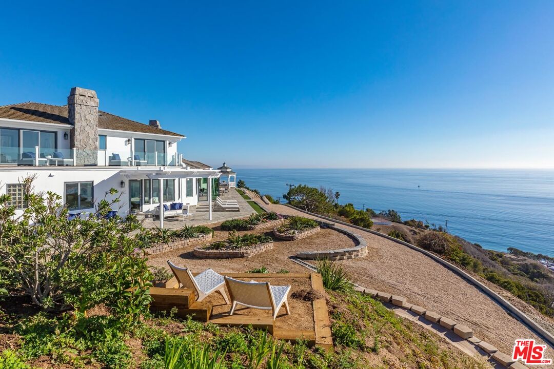 Carbon Mesa Road Malibu, CA 90265 - Photo 41 of 42 a view of a house with a ocean view
