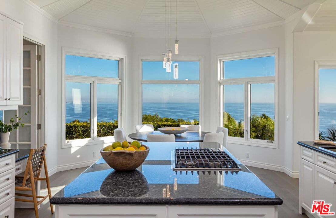 Carbon Mesa Road Malibu, CA 90265 - Photo 6 of 42 a living room with furniture and a rug