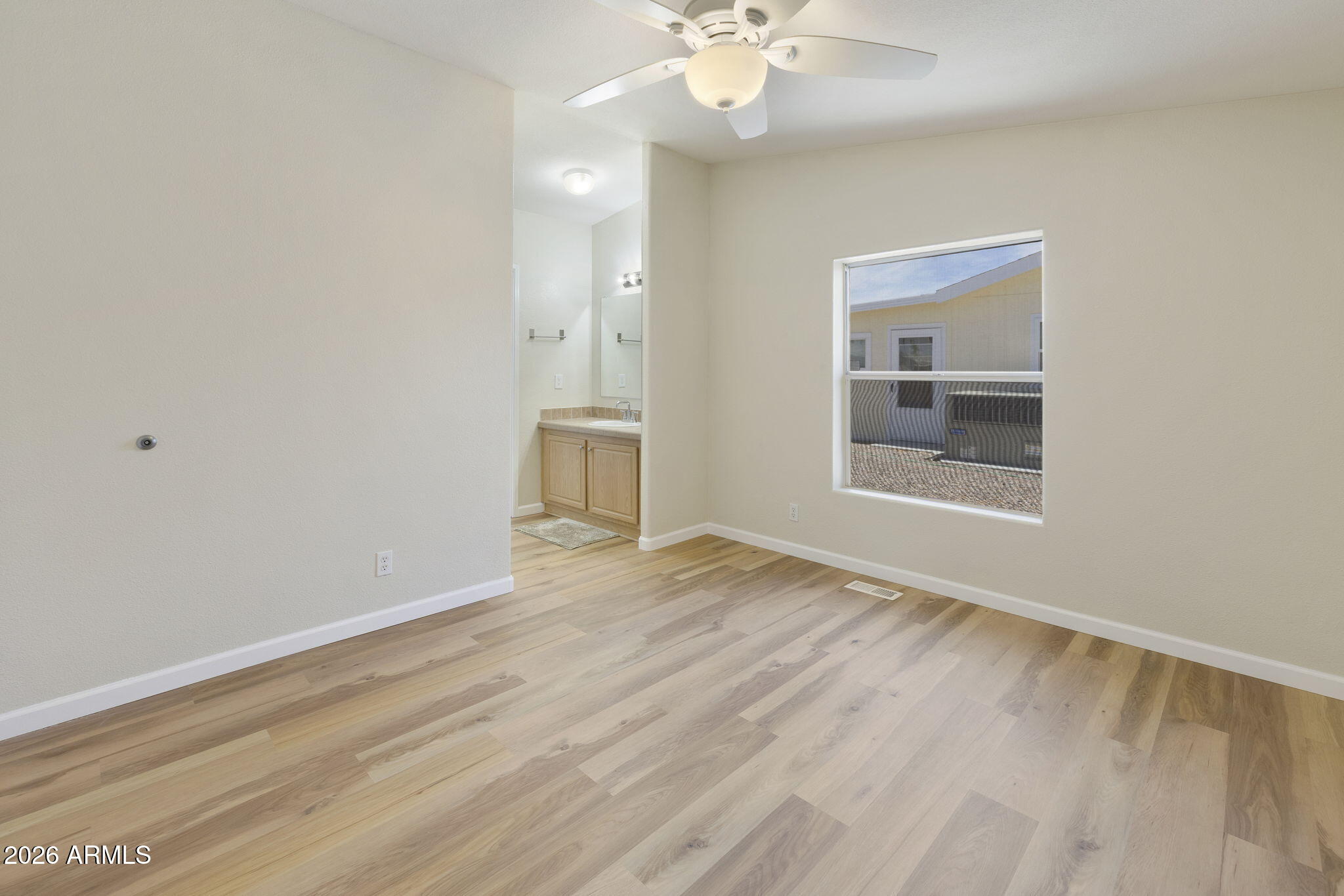 3700 South Tomahawk Road, Unit 51 Apache Junction, AZ 85119 - Photo 32 of 55 Primary bdrm window
