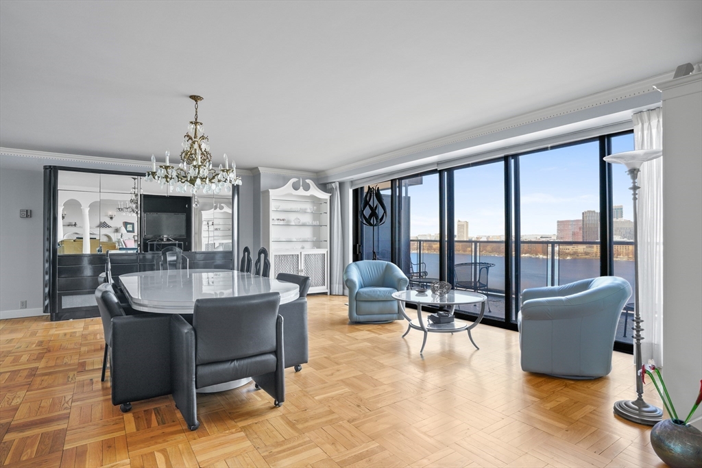 180 Beacon Street, Unit 14FG Boston, MA 02116 - Photo 11 of 40 a view of a livingroom with furniture window and outside view