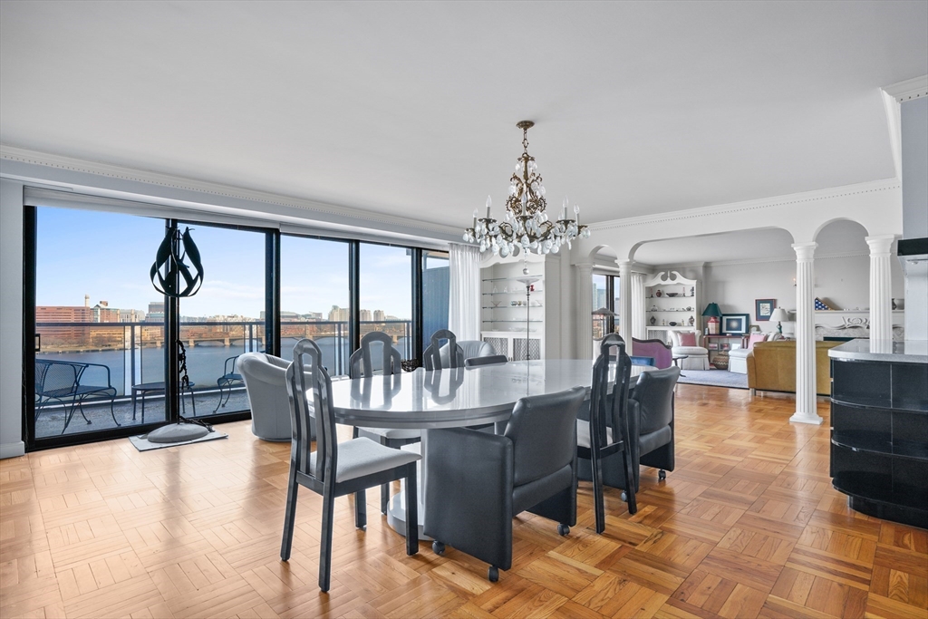 180 Beacon Street, Unit 14FG Boston, MA 02116 - Photo 12 of 40 a view of a dining room with furniture window and outside view
