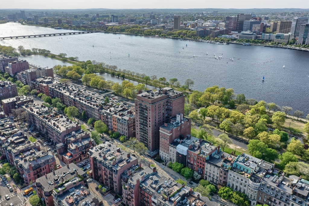 180 Beacon Street, Unit 14FG Boston, MA 02116 - Photo 35 of 40 a view of a lake with a mountain in the background