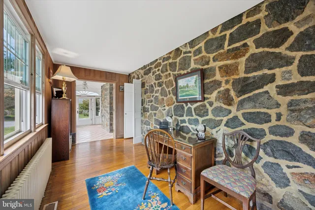 a view of a livingroom with furniture and wooden floor