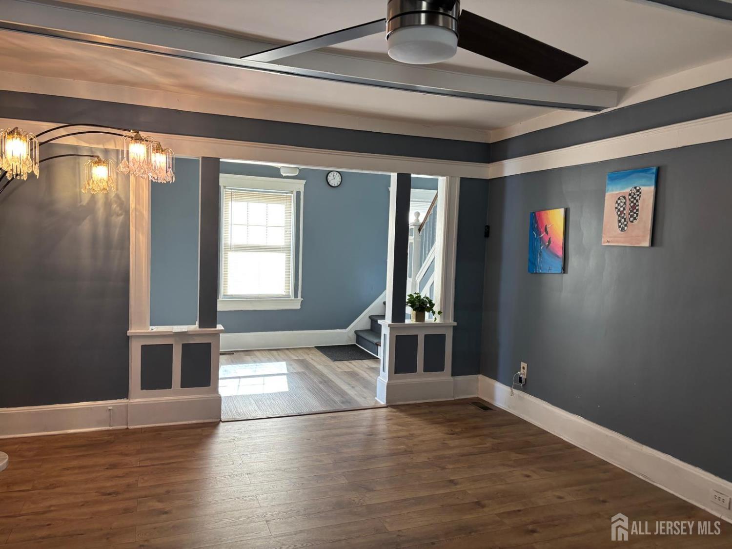 220 South Washington Avenue Dunellen, NJ 08812 - Photo 2 of 11 a view of empty room with wooden floor