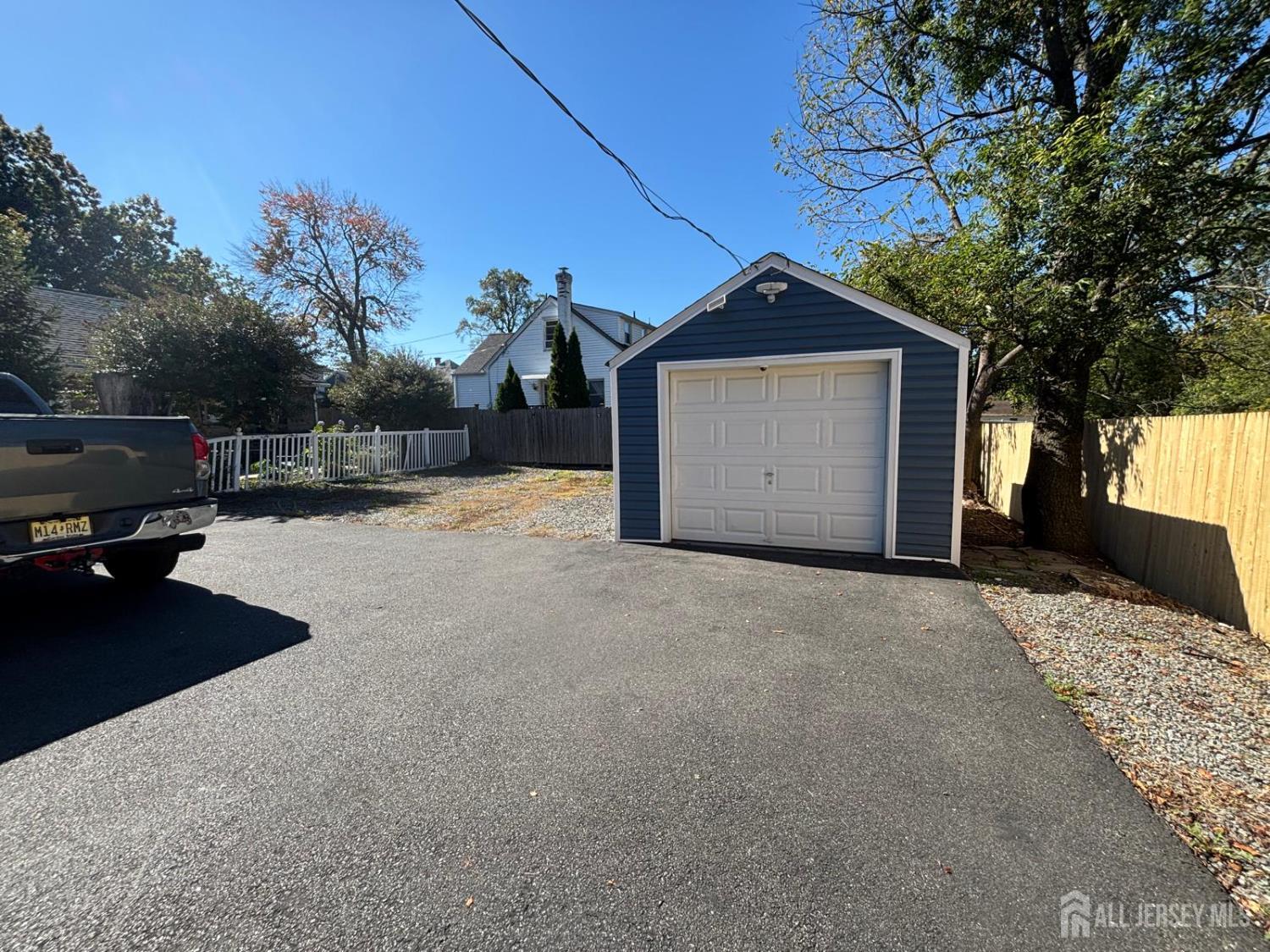 220 South Washington Avenue Dunellen, NJ 08812 - Photo 9 of 11 a view of garage and a yard