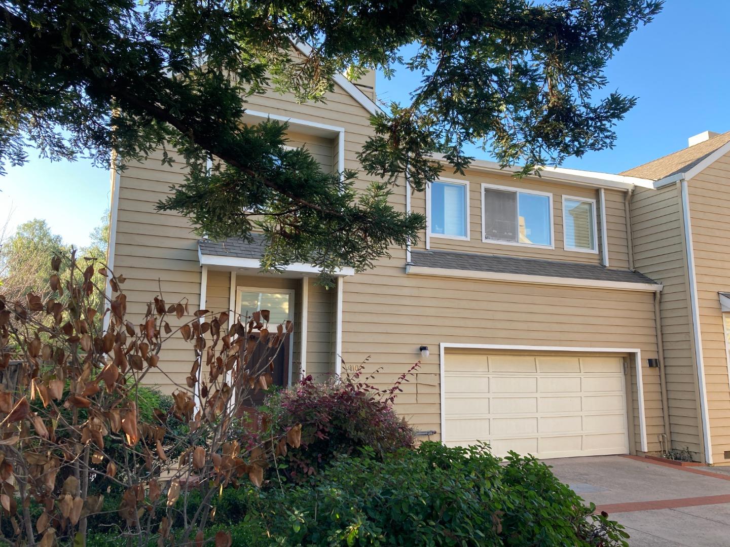 1107 Lautrec Terrace Sunnyvale, CA 94087 - Photo 16 of 16 a front view of a house with garden