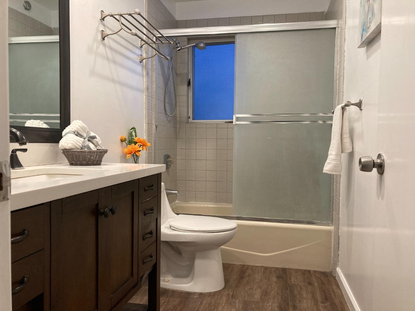 1107 Lautrec Terrace Sunnyvale, CA 94087 - Photo 10 of 16 a bathroom with a sink toilet and shower