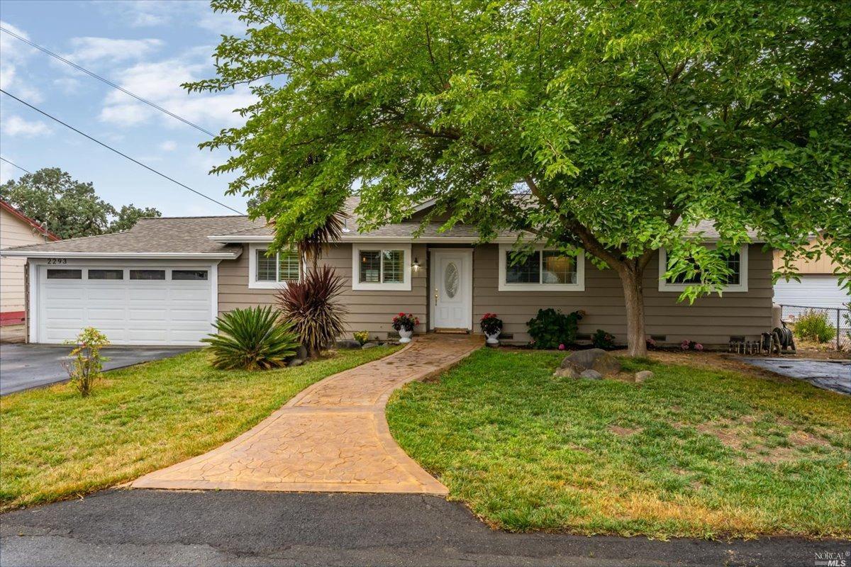 front view of a house with a patio