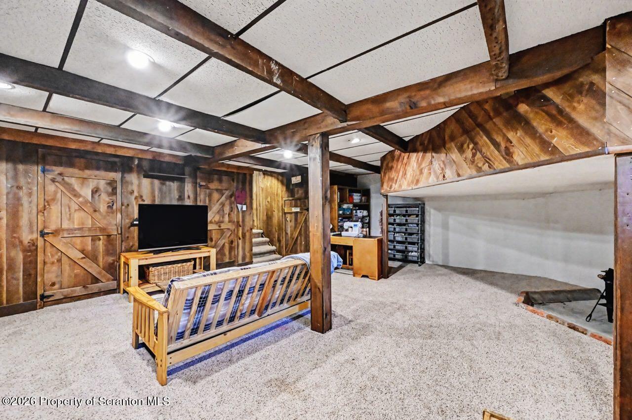719 Scott Road Clarks Summit, PA 18411 - Photo 32 of 51 a view of an empty room with furniture and storage