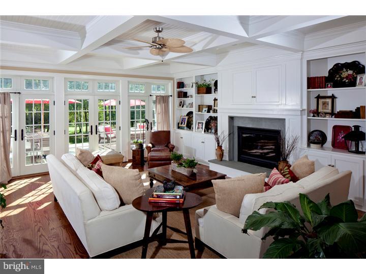 2220 Grubbs Mill Road Berwyn, PA 19312 - Photo 11 of 25 a living room with furniture and a fireplace