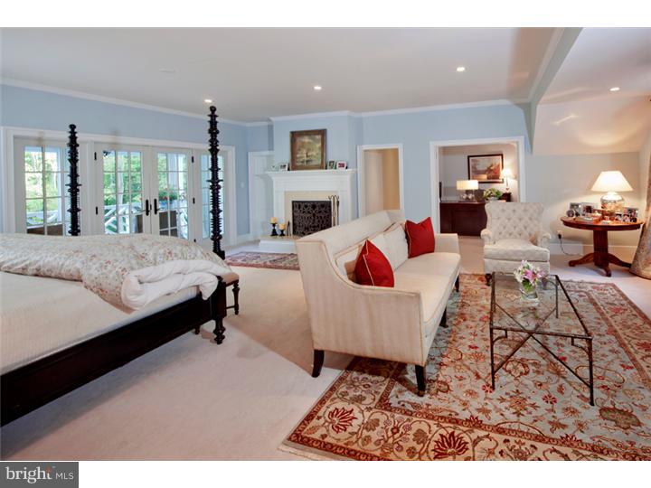 2220 Grubbs Mill Road Berwyn, PA 19312 - Photo 12 of 25 a living room with furniture and a fireplace