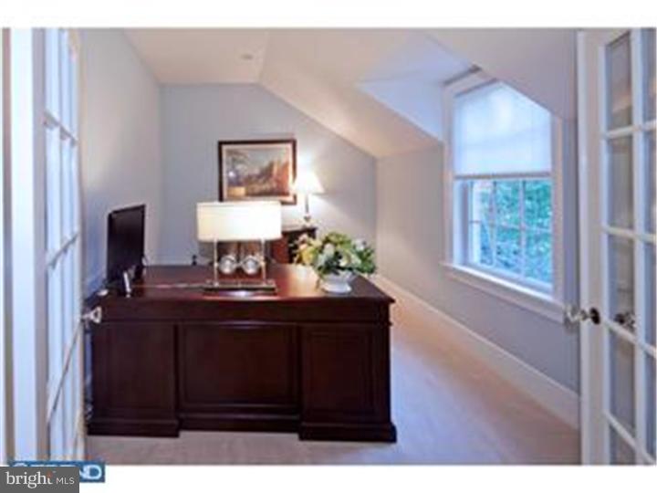 2220 Grubbs Mill Road Berwyn, PA 19312 - Photo 14 of 25 a view of a workspace with furniture and a window