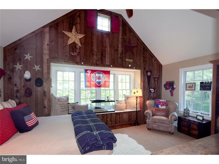 2220 Grubbs Mill Road Berwyn, PA 19312 - Photo 18 of 25 a living room with furniture and a window