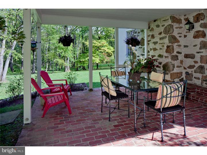 2220 Grubbs Mill Road Berwyn, PA 19312 - Photo 19 of 25 a view of a chairs and table in the patio