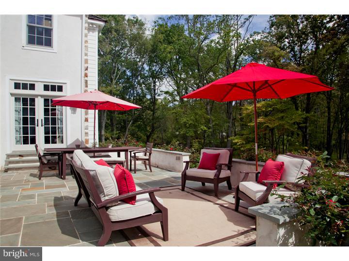 2220 Grubbs Mill Road Berwyn, PA 19312 - Photo 20 of 25 an outdoor sitting area with red umbrella