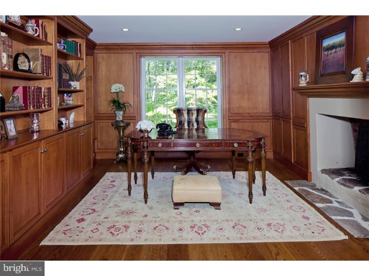 2220 Grubbs Mill Road Berwyn, PA 19312 - Photo 5 of 25 a living room with furniture a window and a flat screen tv