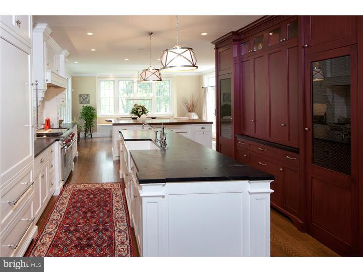 2220 Grubbs Mill Road Berwyn, PA 19312 - Photo 8 of 25 a kitchen with kitchen island granite countertop lots of counter top space