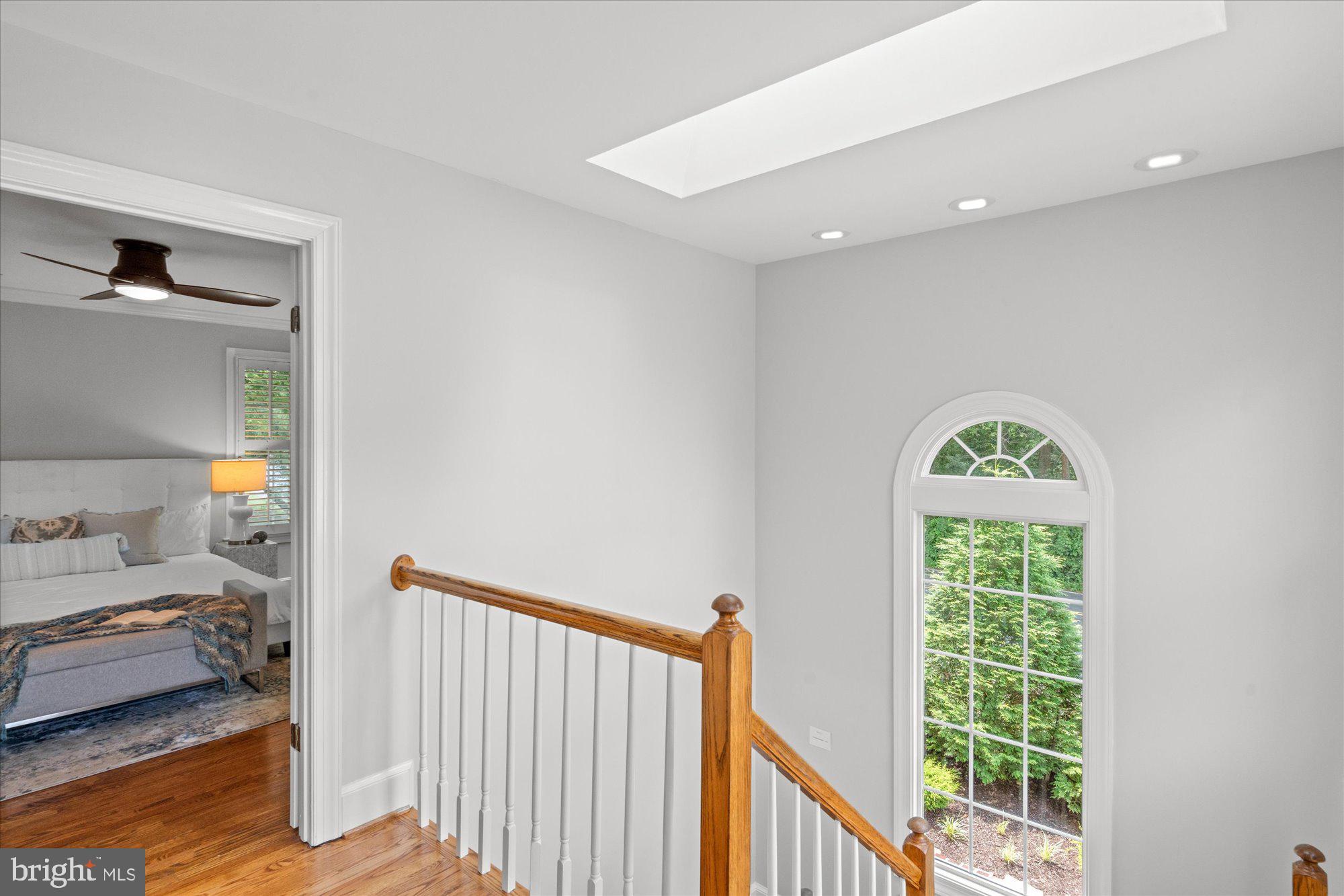7287 Evans Mill Road McLean, VA 22101 - Photo 15 of 30 a bedroom with a bed and a window