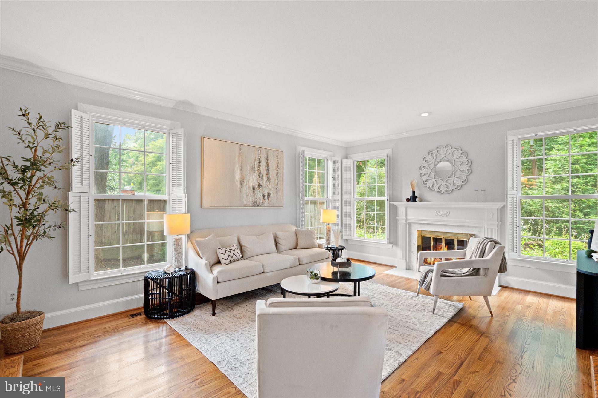 7287 Evans Mill Road McLean, VA 22101 - Photo 5 of 30 a living room with furniture and a fireplace