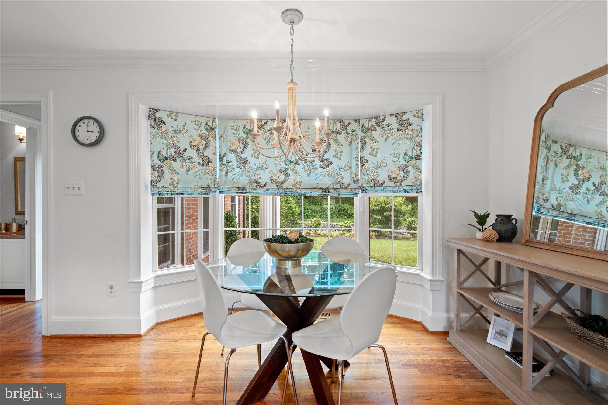7287 Evans Mill Road McLean, VA 22101 - Photo 10 of 30 a view of a dining room with furniture window and wooden floor