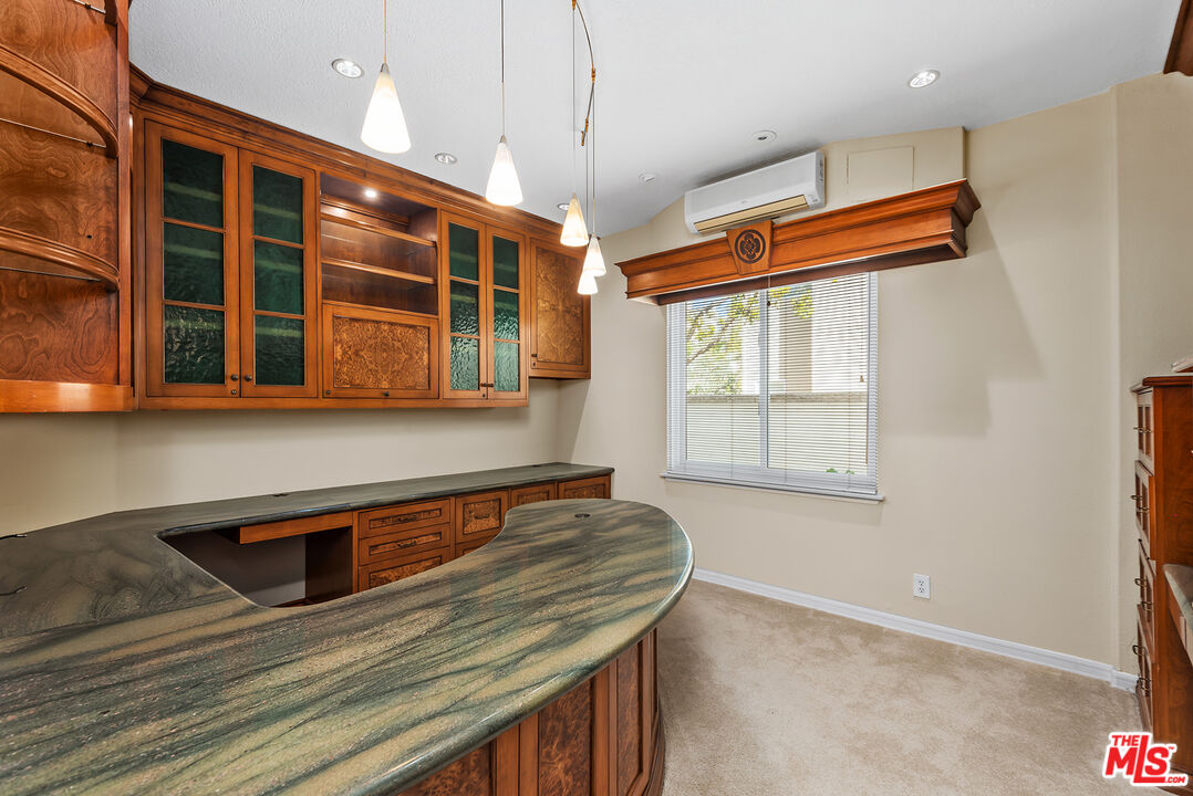 5 Daystar Irvine, CA 92612 - Photo 14 of 52 a kitchen with stainless steel appliances granite countertop a sink and a window