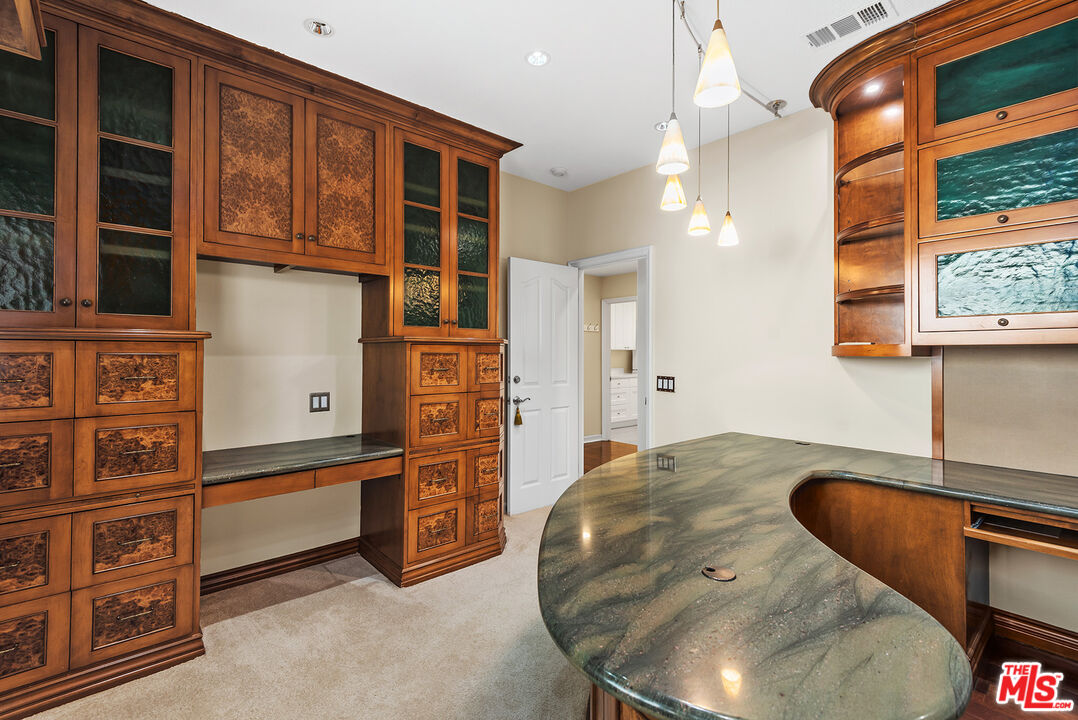 5 Daystar Irvine, CA 92612 - Photo 15 of 52 a kitchen with stainless steel appliances granite countertop a sink and a stove