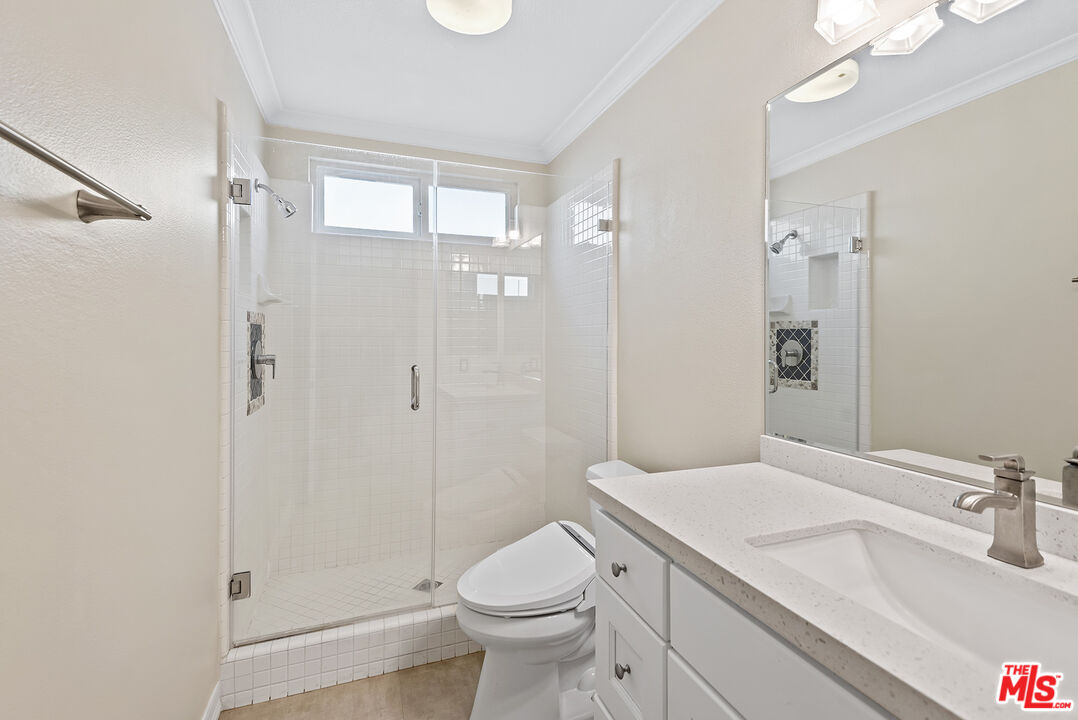 5 Daystar Irvine, CA 92612 - Photo 16 of 52 a bathroom with a sink toilet and shower