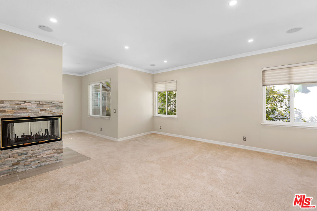 5 Daystar Irvine, CA 92612 - Photo 21 of 52 an empty room with windows and fireplace