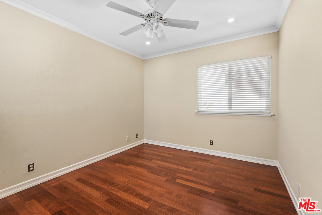 5 Daystar Irvine, CA 92612 - Photo 26 of 52 an empty room with wooden floor and windows