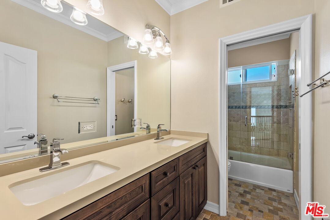 5 Daystar Irvine, CA 92612 - Photo 27 of 52 a bathroom with a sink double vanity and a mirror