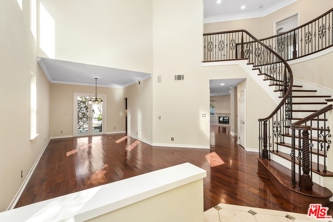 5 Daystar Irvine, CA 92612 - Photo 3 of 52 a view of livingroom with furniture and wooden floor