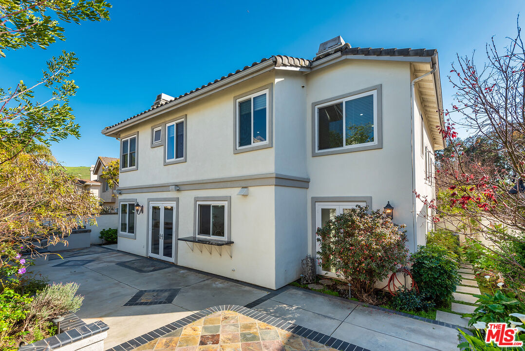 5 Daystar Irvine, CA 92612 - Photo 35 of 52 a front view of a house with a yard