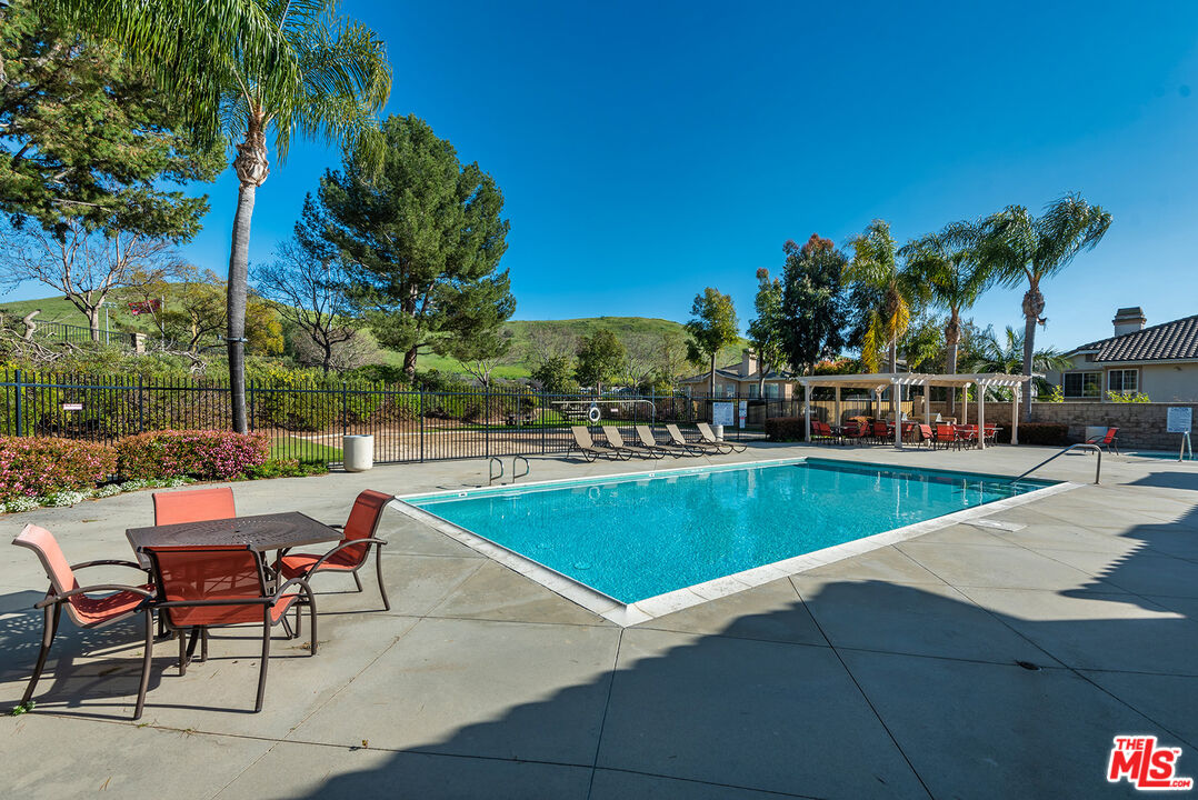 5 Daystar Irvine, CA 92612 - Photo 49 of 52 a view of a swimming pool with outdoor seating and plants