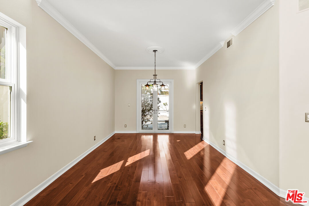 5 Daystar Irvine, CA 92612 - Photo 5 of 52 a view of a big room with wooden floor and windows