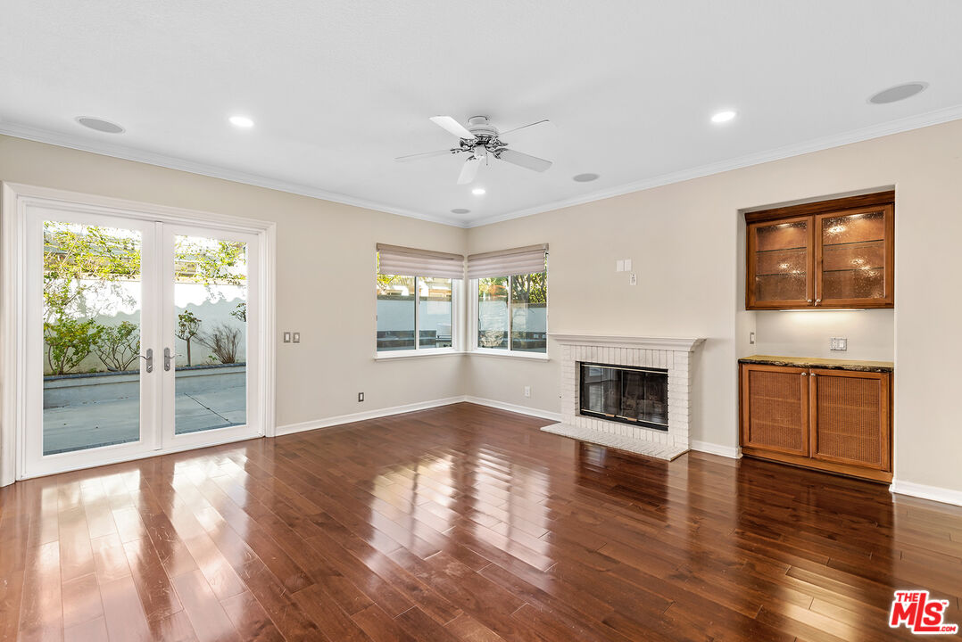 5 Daystar Irvine, CA 92612 - Photo 8 of 52 a view of an empty room with window and wooden floor