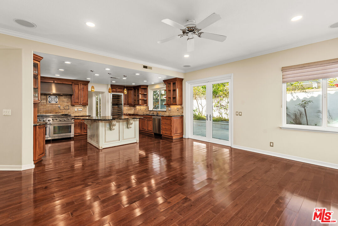 5 Daystar Irvine, CA 92612 - Photo 9 of 52 a view of a big room with wooden floor and a kitchen