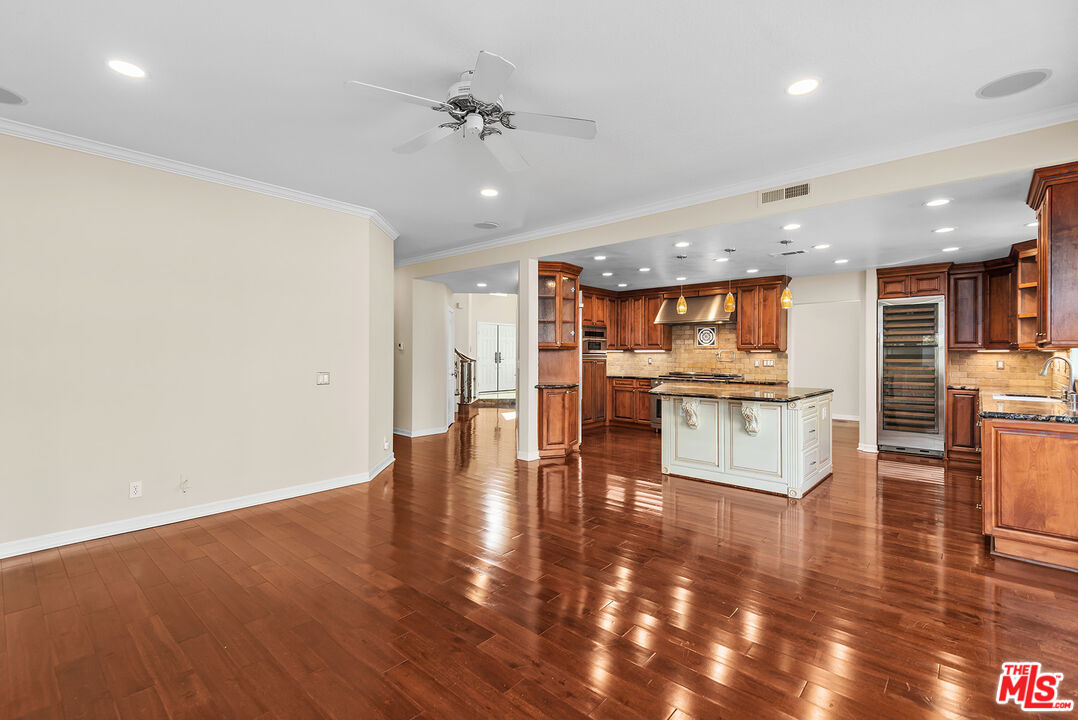 5 Daystar Irvine, CA 92612 - Photo 10 of 52 a view of kitchen with cabinets and wooden floor