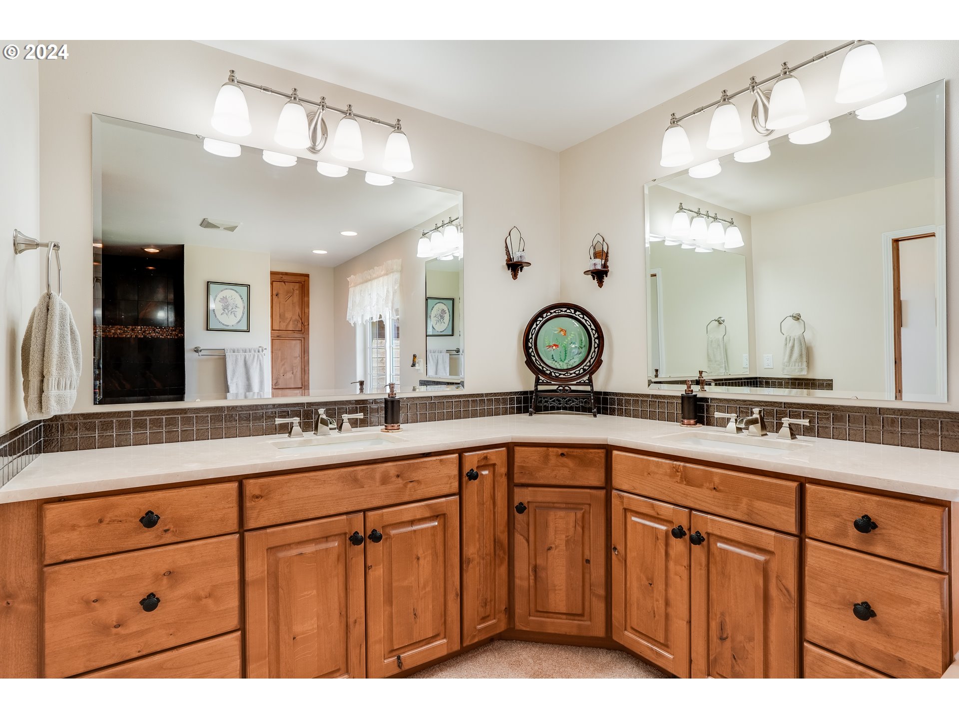 11 Deer Ridge Road Goldendale, WA 98620 - Photo 12 of 45 a bathroom with a sink a large mirror and vanity